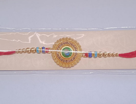 Peacock Feather Design Rakhi With Beaded Detailing